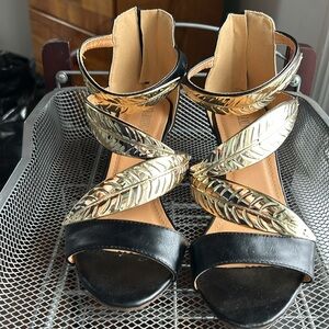 Size 8 Gold and black Charming Lady heels